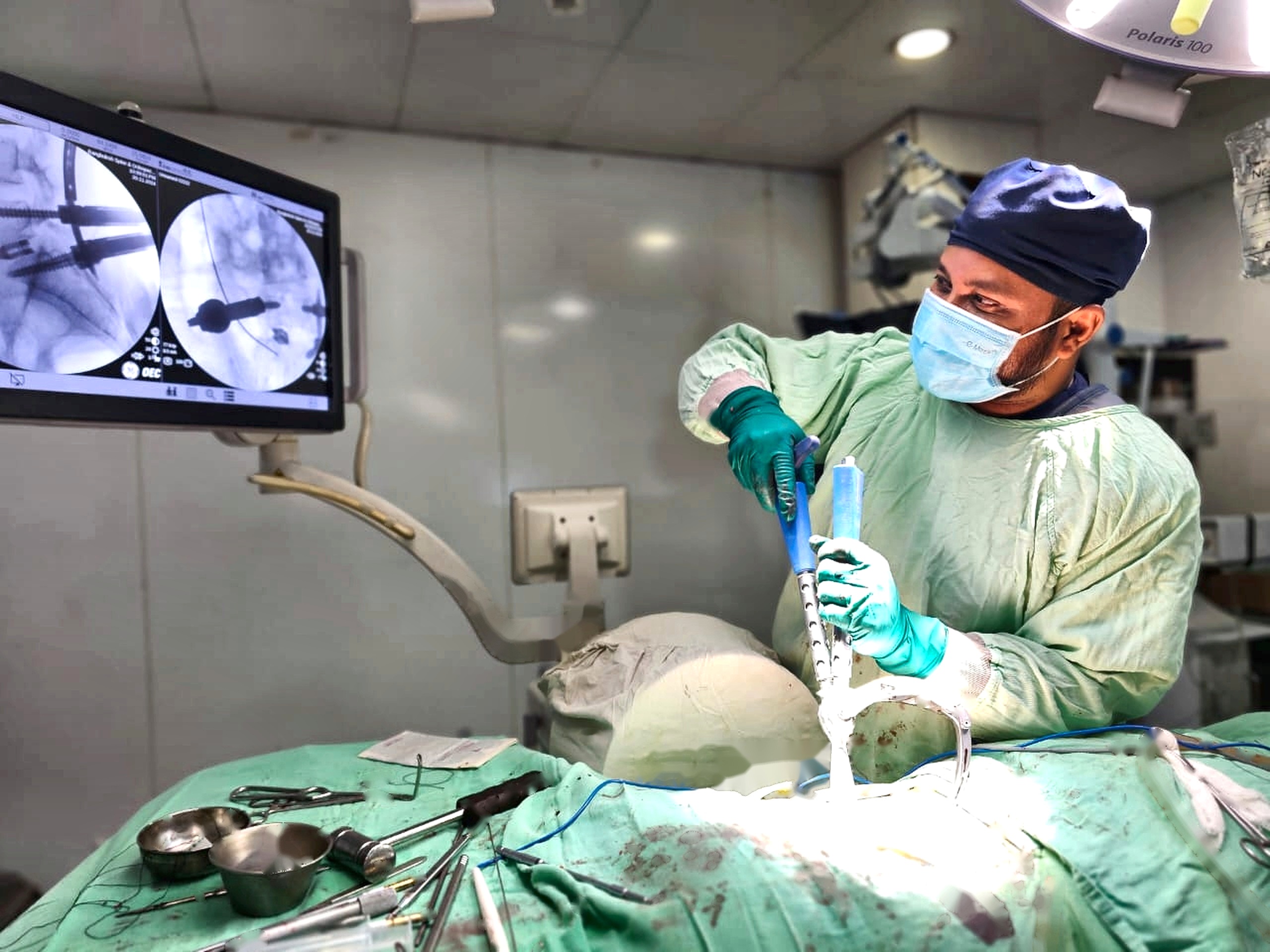 Dr. Choudhury performing minimally invasive spine surgery